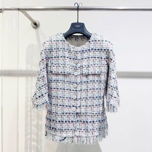 Authentic CHANEL White and Black Label Detail